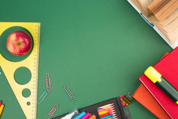 istock Back to school. Stationery on a green table. Office desk with copy space. Flat lay. 2149704217