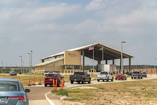Eagle Pass, TX, US-April 8, 2024: Checkpoint near the US-Mexico border. Inland border check points are common and cars are searched for illegal and undocumented migrants on the southern US border.