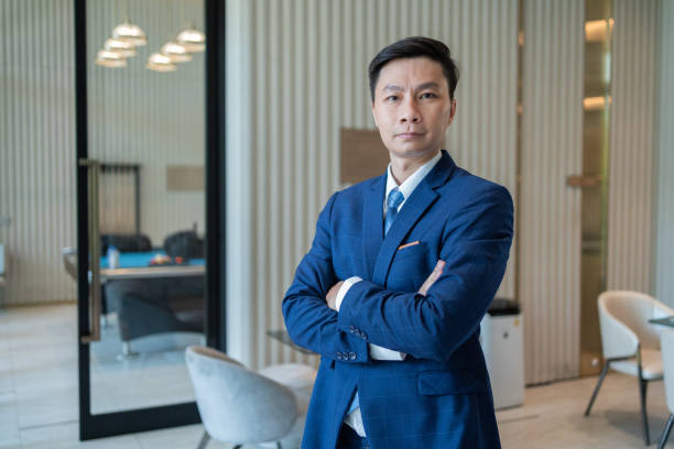 istock Confident Businessman with Tablet in Modern Office 2149705977