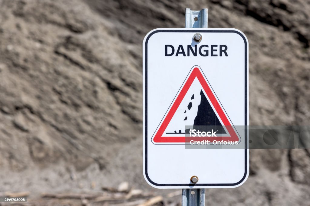 Rocks Warning Sign Falling Rocks Warning And Danger Road Sign Stock Photo - Download Image ...