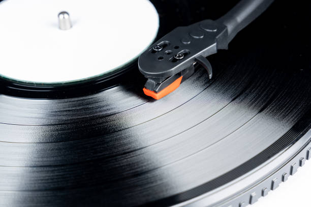 istock Vinyl turntable with vinyl plate. Modern gramophone record player. Retro sound technology to play music 2149709496