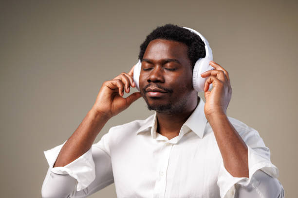 istock Young man listening to music - tranquilizing moment 2149711299