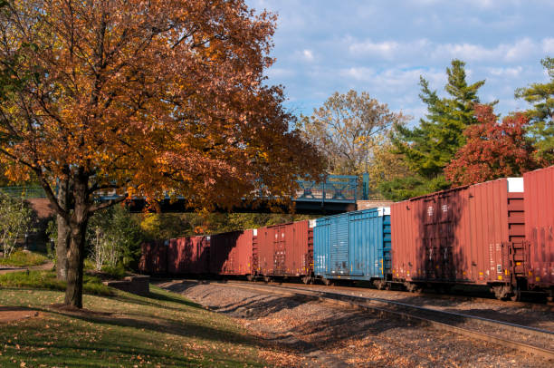 Trains - Freight Train Passes Through Kirkwood on Autumn Day