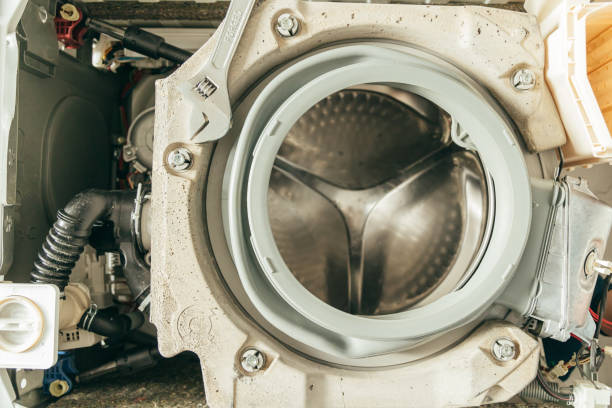 istock Gasket mount of a front loading washing machine being serviced without front cover, disassembled 2149712348