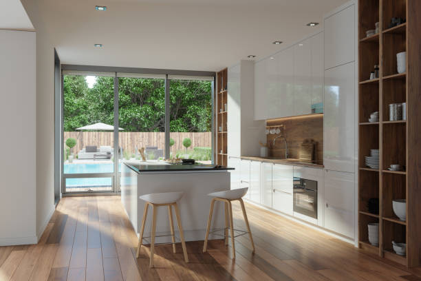 Stylish and modern kitchen illuminated by morning light.