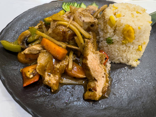 istock Chinese beef fillet with rice and noodles 2149714587