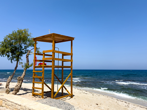 A lifeguard tower station on the beach