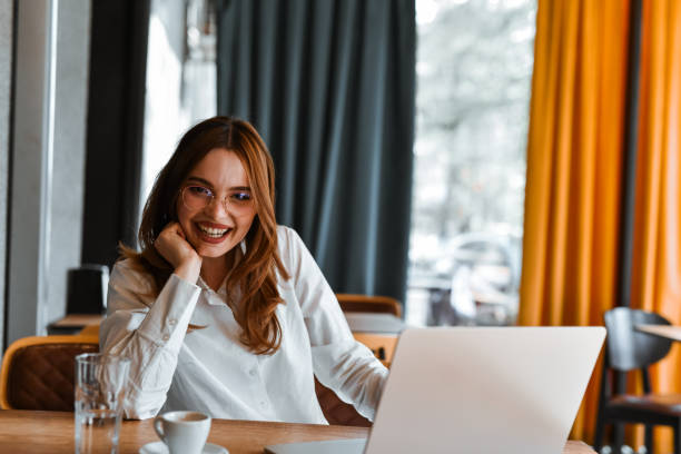 istock Female Taking A Break From Working On Laptop And Showing Her Radiating Smile 2149717088