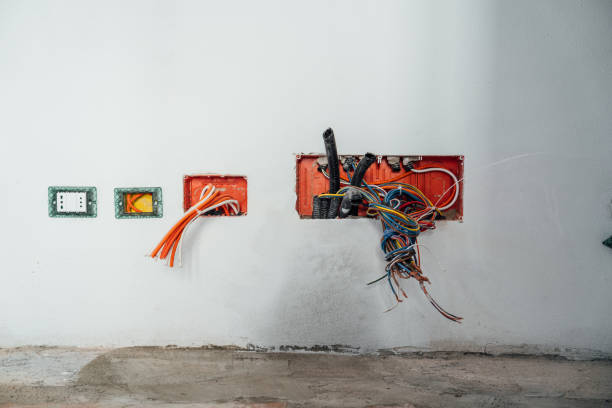Work in progress on the electrical system of an apartment. Many electric cables.