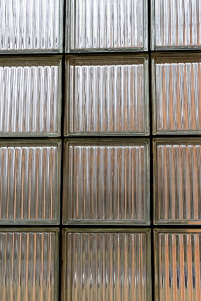 istock An old glass block window with vertical textures. 2149717362