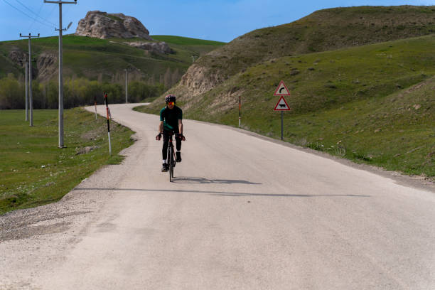 istock Athlete cycling outdoors. 2149717521