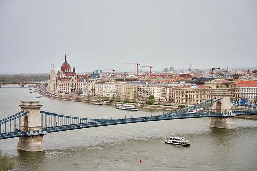 Panoramic view on skyline of Budapest city with Chain Bridge along Danube River. Architecture of capital of Hungary with historical buildings and famous landmarks