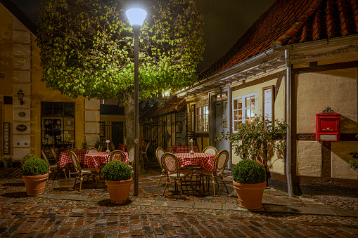 Night scene of the restaurant Under the Linden Tree at H C Andersen´s House, Odense, Denmark, April 19, 2024