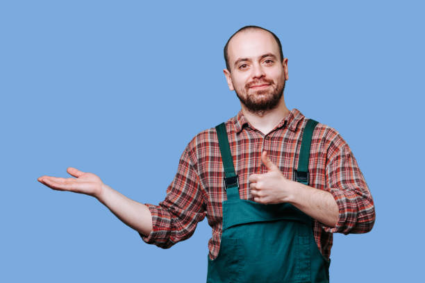 istock A young man with a thumb up and an outstretched hand, 2149721724