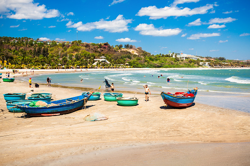 Fisherman boats at the beach in Mui Ne or Phan Thiet in Vietnam