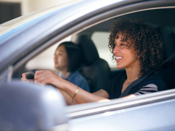 istock Friends Driving in a Car 2149724277