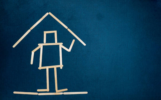 Family and homeownership concept on wooden background