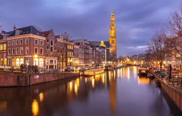 istock Night Amsterdam canal and Westerkerk church 2149729664