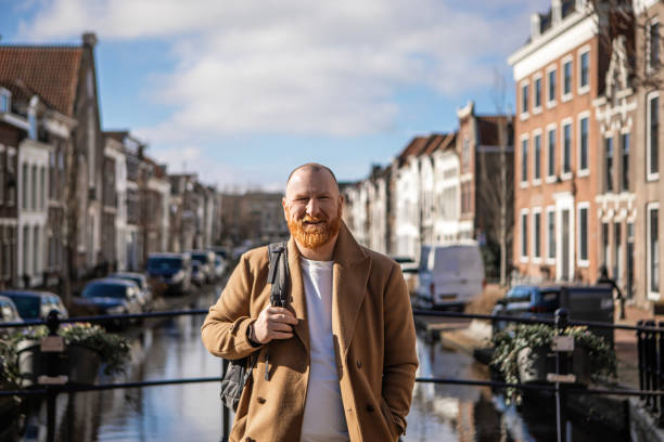 istock Redhead tourist man exploring whilst walking in a dutch city 2149733995