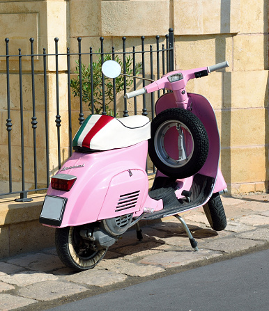 antique vehicle piaggio vespa 50 special pink 27 September 2023 Castro Italy