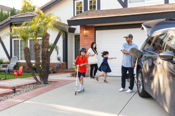 istock Family with electric vehicle 2149743581