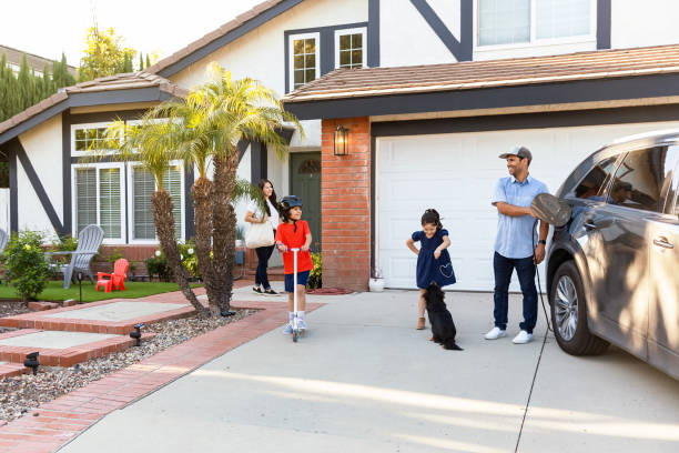 istock Family with electric vehicle 2149743582