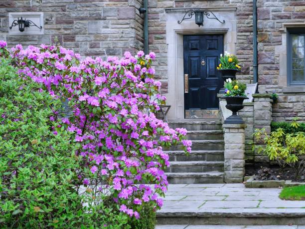 istock Old stone house with spring flowers 2149744383