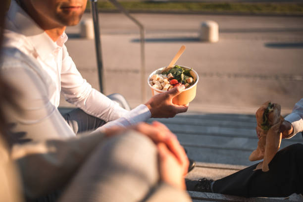 istock Asian Businessman and Takeaway Bowls 2149747901