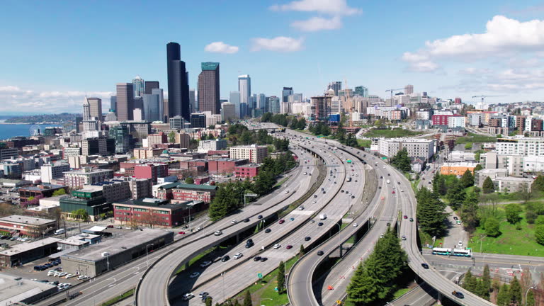 Freeway Intersection Ramps with Seattle Skyline Aerial View
