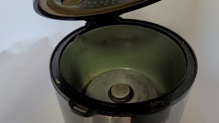 Domestic rice cooker kitchen equipment in poor condition