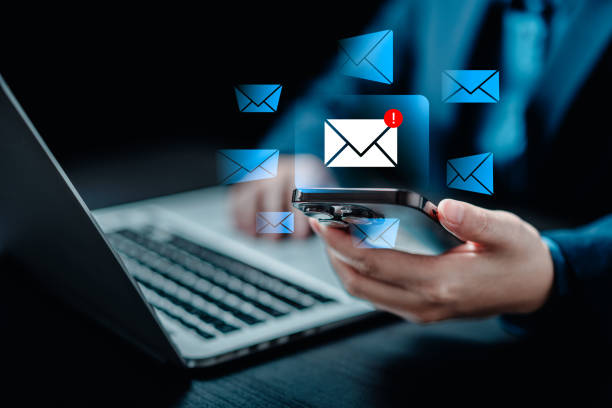 istock Businesswomen checking email via smartphone have spam malware screen alerts, cyber internet web hack attacks, warning errors, sniffing attacks, phishing, cybersecurity network concept 2149750779