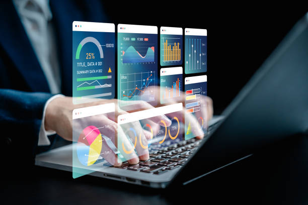 istock Businesswomen analyze chart data business on a visual screen dashboard laptop, technology devices and screens visible in the background, financial planning, market research, and the stock market. 2149753179
