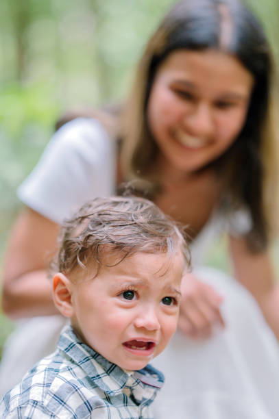 istock Modern Young mother with a small daughter enjoyg camp at park exploring nature 2149755563