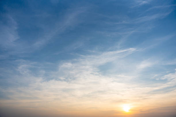 istock Dramatic cloudy sky and bright sunrise or sunset over the horizon. Natural skyscape background 2149755981