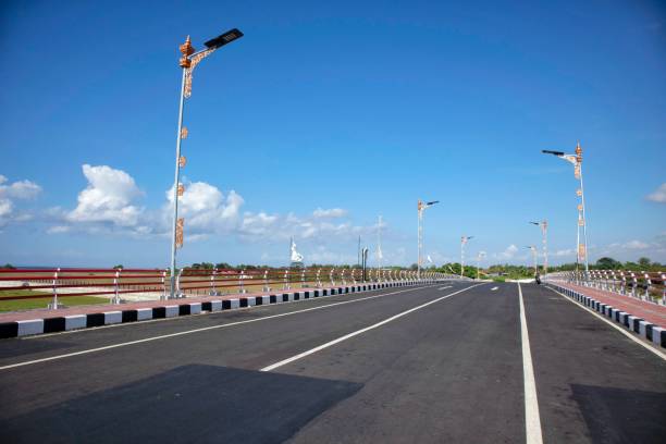 istock view of a long road with a quiet clear sky 2149758631