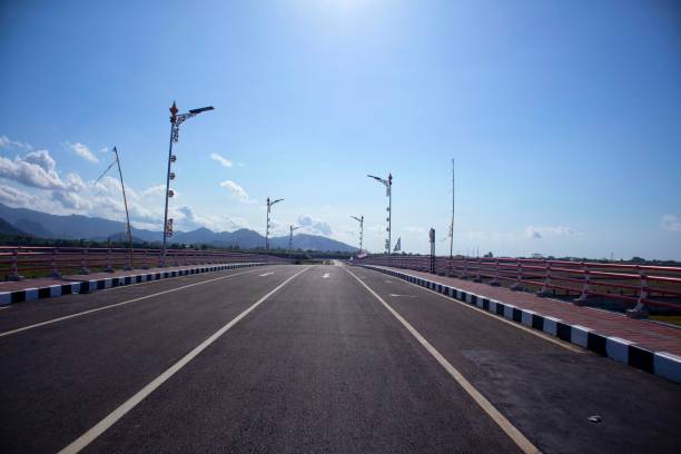 istock view of a long road with a quiet clear sky 2149758637