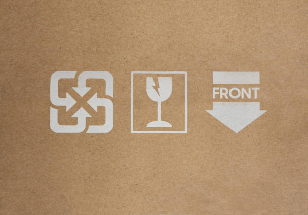 istock Fragile, front and recycle icons set on brown cardboard 2149761260