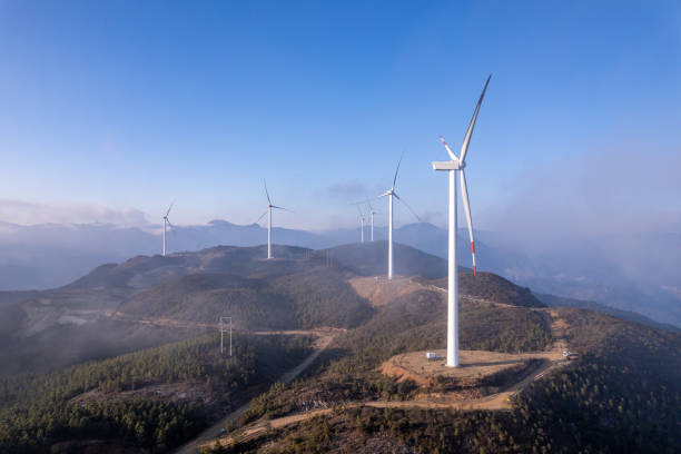 istock The wind turbine on the mountaintop in the mist 2149761892