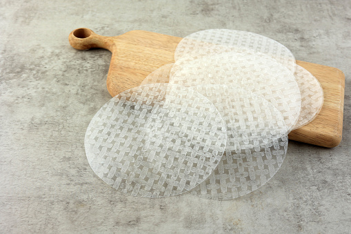 Vietnam Rice Paper for Spring Roll on Wooden Chopping Board