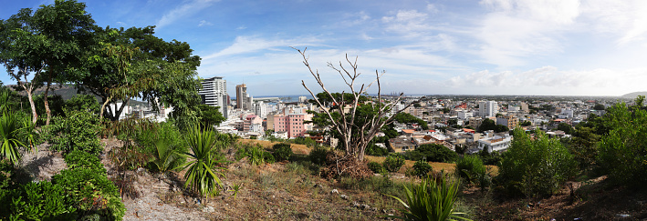 Bogota, Colombia - January 23, 2023: Panoramic view of buildings and university citadel with Monnserrate hill in the background