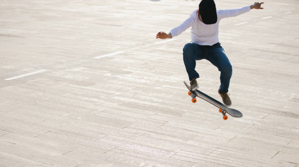istock Skateboarder skateboarding outdoors in city 2149763953