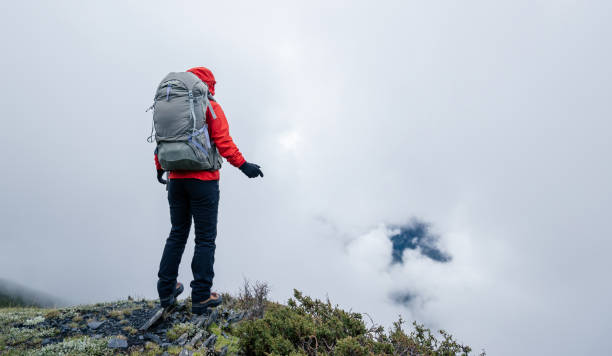 istock Hiking woman on high altitude mountain top 2149764071