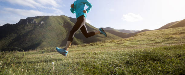istock Young woman ultramarathon runner running at mountain top 2149764659