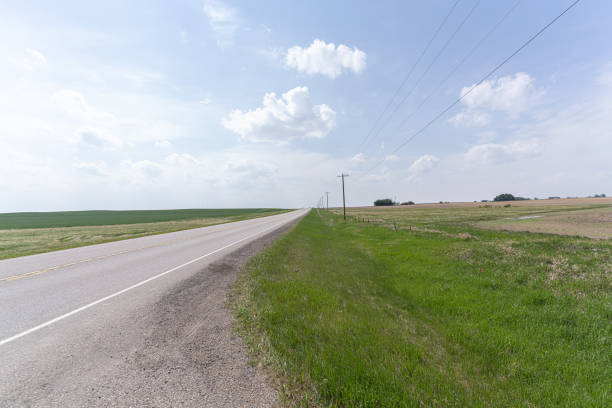 istock Road leading into the distance in Alberta 2149766634