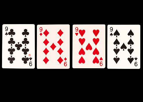 Top view of deck of cards with the ace of hearts on top