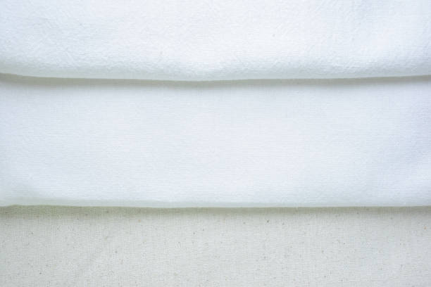 istock stack of white cotton clothes, textile fashion industry 2149768474