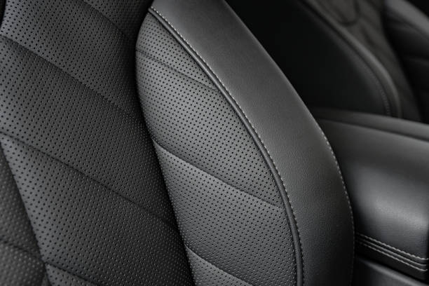 istock Black Perforated Leather Seat Side Bolster with Stitching Details Closeup 2149769102