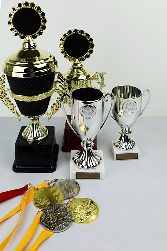 cups and medals for awarding the winners. Sports, competitions
