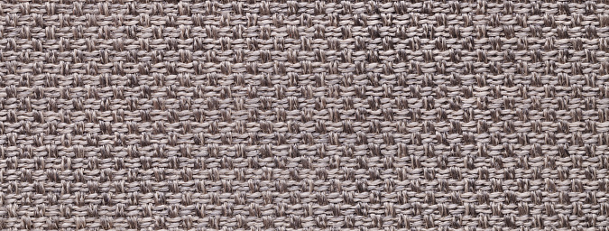 Texture of brown color background from woven textile material with wicker pattern, macro. Structure of vintage fabric cloth, narrow backdrop. Light brown background with checkered pattern, closeup. Structure of the gray fabric macro.