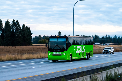 October 2022 - Spokane, Washington.
Flixbus motorcoach charter bus on Interstate 90 in Spokane, WA. Flixbus has acquired Greyhound Lines, and operates both on intercity routes.
